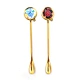 gold stirring spoon